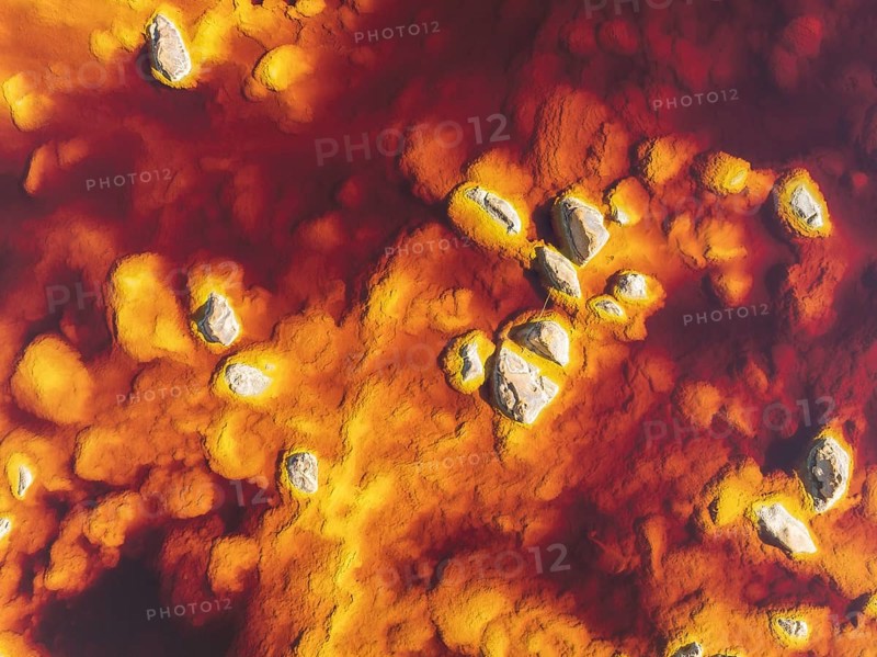 Detail of the Rio Tinto (Red river) with its deep reddish hue due to oxidised iron minerals in its water, aerial view, drone shot, Huelva province, Andalusia, Spain, Europe