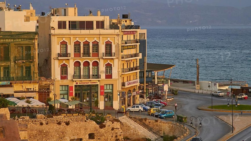 Morning light, houses at the harbour, roundabout, cars, harbour, Heraklion, capital, island of Crete, Greece, Europe