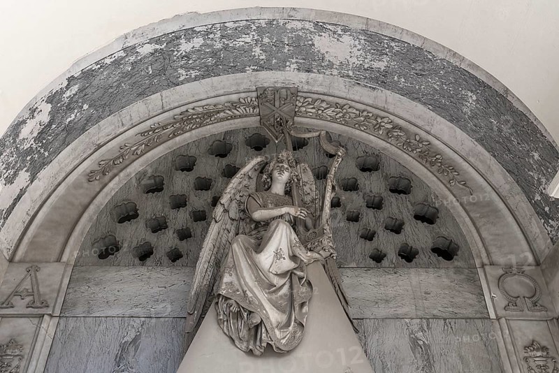 Angel playing the harp, sculpture on a family tomb, Monumental Cemetery, Cimitero monumentale di Staglieno), Genoa, Italy, Europe