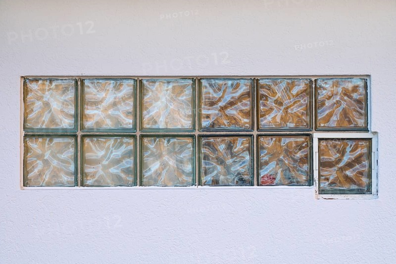 Glass blocks in whit wall, Germany, Europe