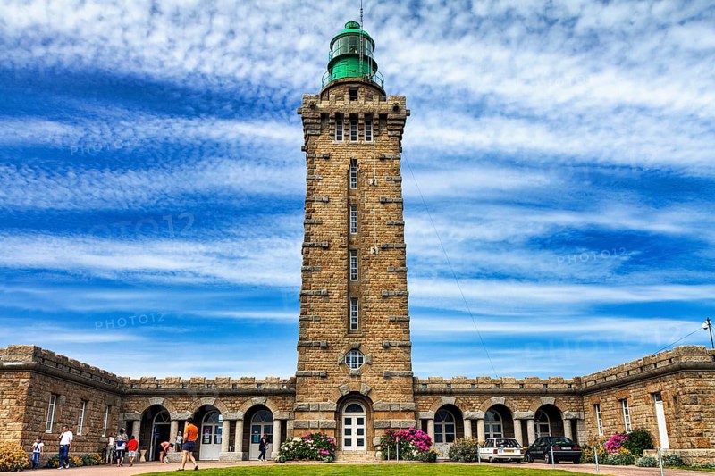 Cap Fréhel lighthouse with tourists, Emerald Coast, Brittany, France, Europe