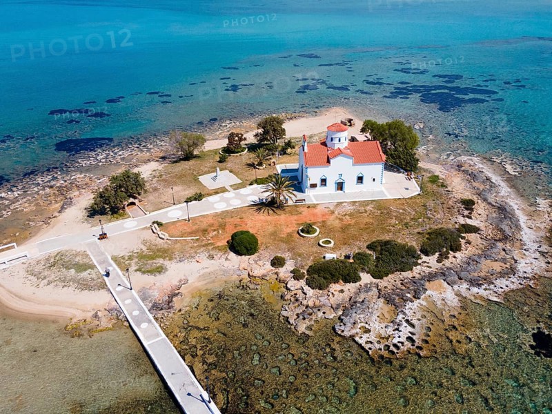 Drone shot, Saint Spiridon Greek Orthodox Church, Agios Spyridon, Elafonisos town, Elafonisos, Deer Island, Laconia, Peloponnese, Ionian Islands, Ionian Sea, Greece, Europe