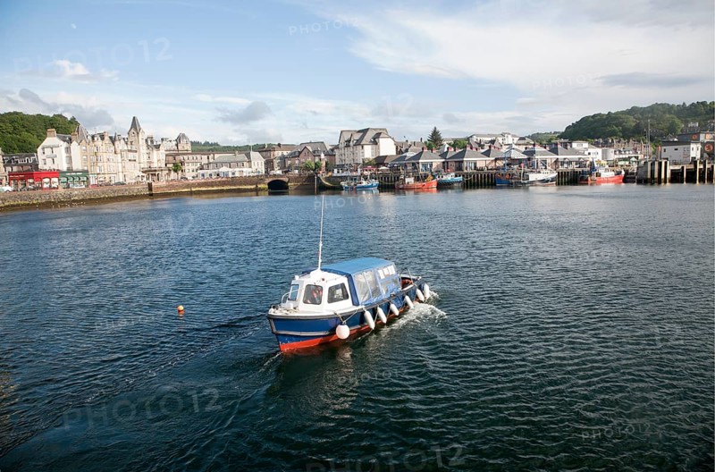 Small ferry boat in the harbour at Oban, Argyll and Bute, Scotland, UK