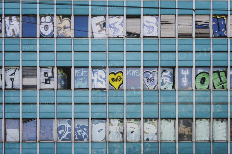 The logo of Berlin's public transport company BVG appears as graffiti on an empty office building in Berlin, 29/02/2024