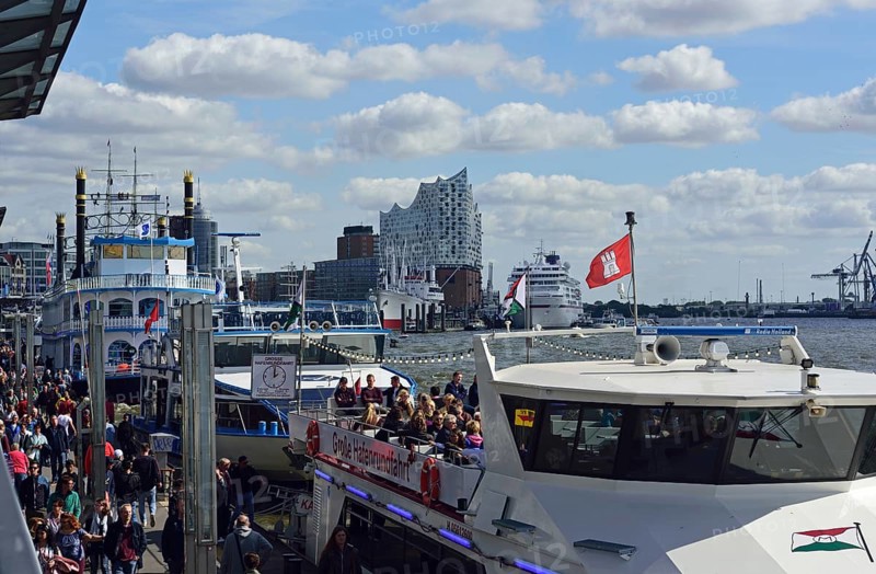 Europe, Germany, Hanseatic City of Hamburg, Elbe, Elbe Philharmonic Hall, glass facade, harbour tour with harbour ferry, many tourists, passenger ship Europa at the Überseebrücke, Europe
