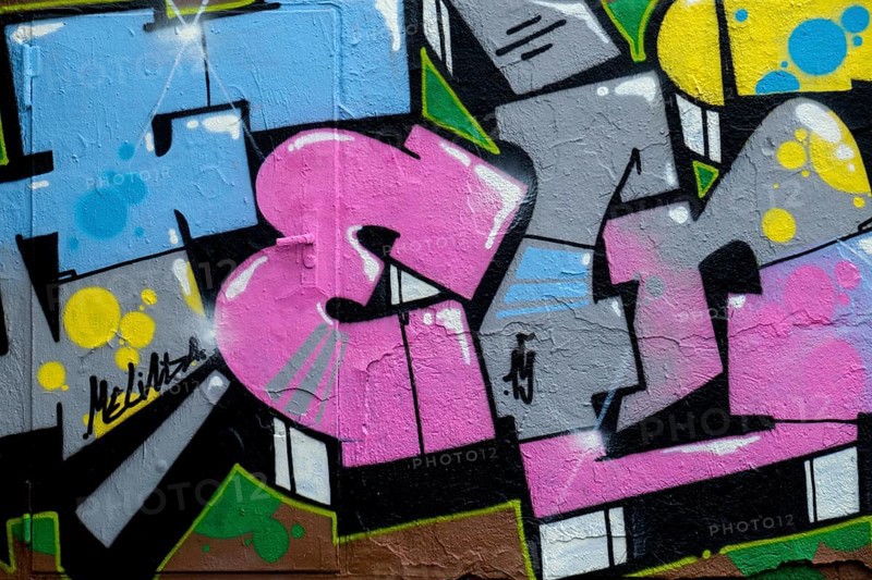 Abstract graffiti art in vibrant colours with dynamic shapes on a rough wall, Landau, Rhineland-Palatinate, Germany, Europe