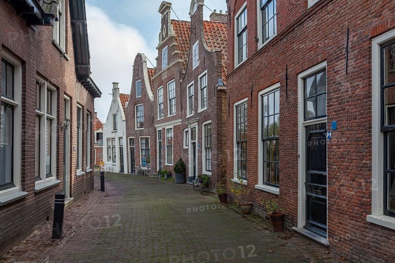 Alley with historic houses in the town of Blokzijl, province of Overijssel, Netherlands
