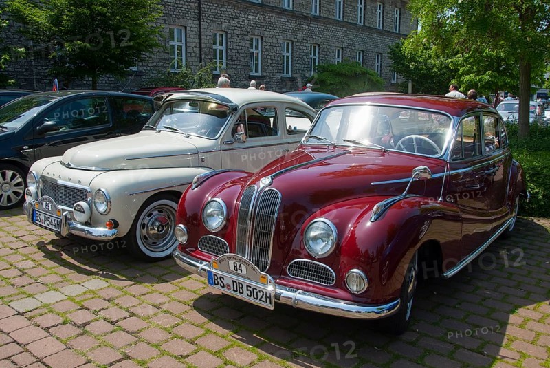 Two vintage cars in red and white parked next to each other in the shade, vintage car, Volvo PV 544, 1964, and BMW 502, 2600 L, 1962, Lower Saxony, Germany, Europe