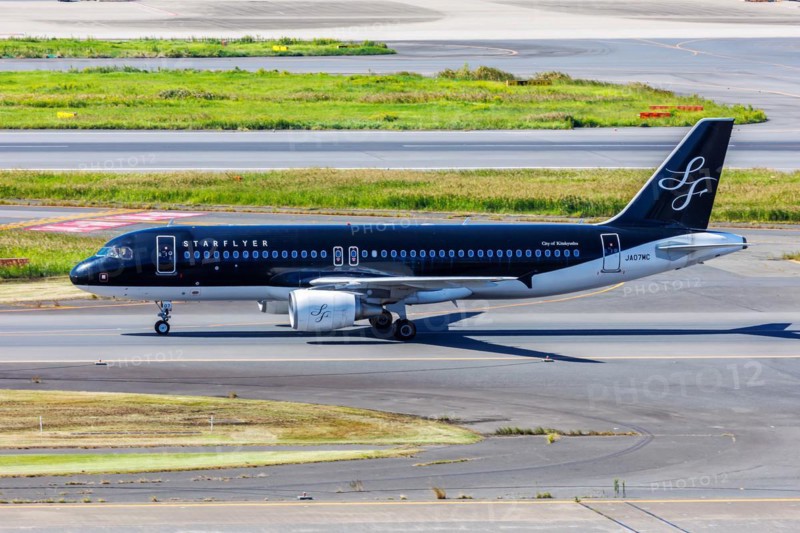 A Starflyer Airbus A320 aircraft with the registration number JA07MC at Tokyo Haneda Airport, Japan, Asia
