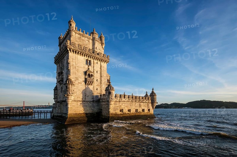 Belem Tower or Tower of St Vincent, famous tourist landmark of Lisboa and tourism attraction, on the bank of the Tagus River Tejo on sunset. Lisbon, Portugal, Europe