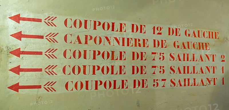 Hallway with directions for cupolas inside Fort of Liezele, fortress of the fortified area of Antwerp, Puurs-Sint-Amands, province of Antwerp, Belgium, Europe