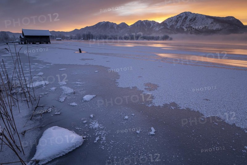 Mountains reflected in lake, dawn, fog, winter, snow, icy, Lake Kochel, Alpine foothills, Bavaria, Germany, Europe