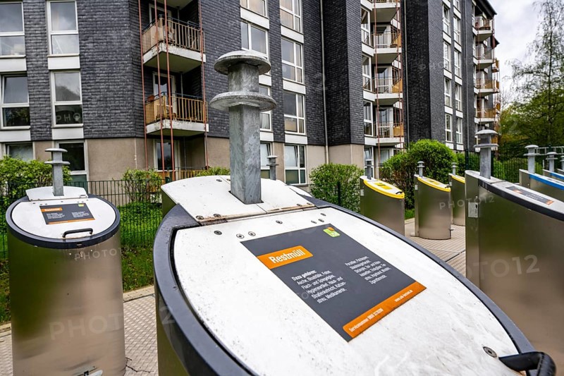 Underground waste disposal system, waste columns for different types of waste, in underground collection containers, at a residential complex in Bochum, North Rhine-Westphalia, Germany, Europe