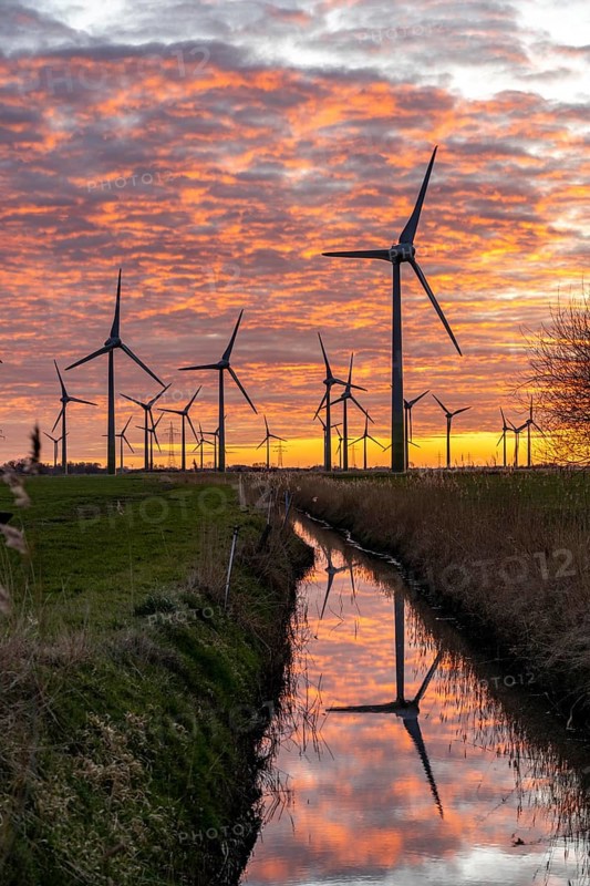 Wind farm near the East Frisian town of Norden, east of the town, sunset, Lower Saxony, Germany, Europe