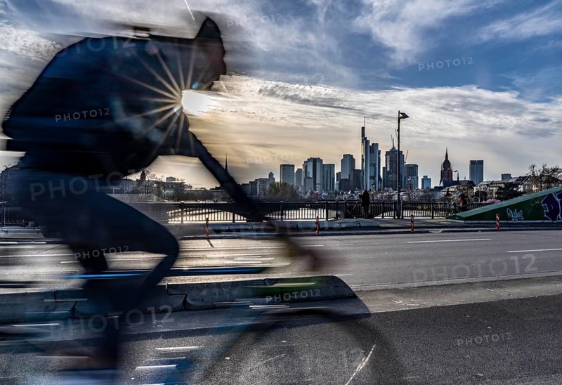 Skyline of Frankfurt am Main, skyscrapers, cyclists on the Flößerbrücke, Hesse, Germany, Europe