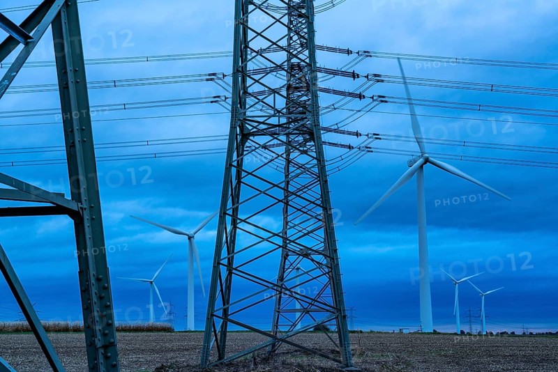 Wind farm near Niederaußen, high-voltage power lines, town of Bergheim, storm, strong wind, wind turbines, North Rhine-Westphalia, Germany, Europe