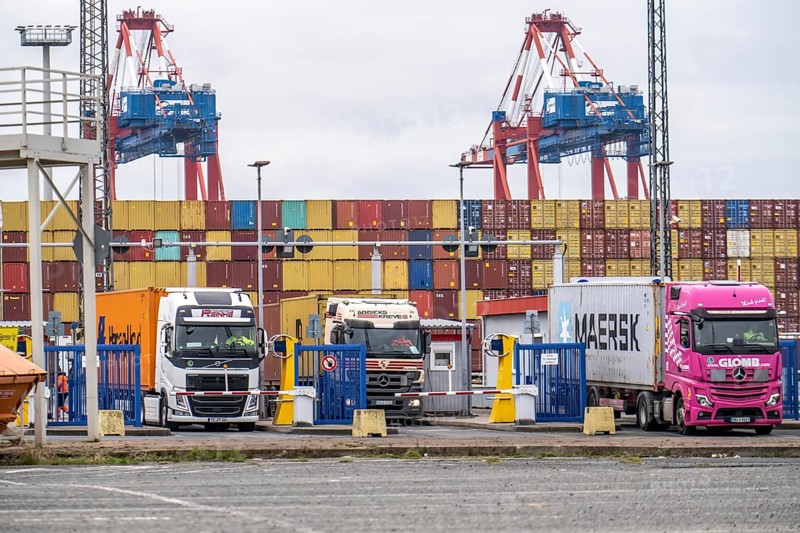 Entry and exit for container lorries, to the MSC container terminal in the seaport of Bremerhaven, Eurogate Container Terminal with almost 50 container gantry cranes, over a length of more than 4 km at the mouth of the Weser, Bremerhaven, Bremen, Germany, Europe