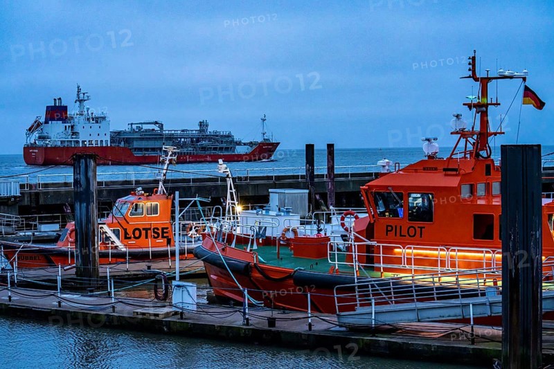 Pilot boats, Pilot Boats, at the pier at the Alte Liebe in the harbour of Cuxhaven, cargo ship enters the Elbe, Lower Saxony, Germany, Europe