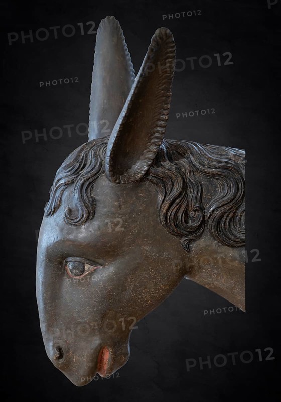 Palm donkey, detail of donkey's head, wooden figure from 1470 on a dark background, Franciscan Museum, Villingen, Baden-Württemberg, Germany, Europe