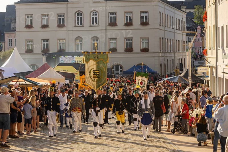 The so-called Bergstreittag is a beautiful centuries-old tradition and is celebrated on 22 July, the church memorial day and former feast day of Mary Magdalene in Schneeberg. The four quarterly sermons introduced in 1649 remained in place until 1845. These sermons were then abolished in favour of a single day, 22 July, which fell on Mary Magdalene. The Freiberg Mining Office recommended that this day should be celebrated with a festival and a mountain parade. In 1846, the Royal Ministry of Finance issued a decree to celebrate St Mary Magdalene's Day with a sermon and a magnificent mountain procession. The last major procession took place in July 1913. The First World War put an end to these processions. The tradition was not revived until July 1933, 528th Bergstreittag, mountain parade, Schneeberg, Saxony, Germany, Europe