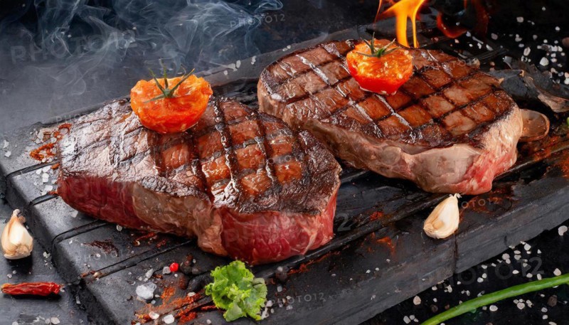 Food, dishes, two beef steaks on a charcoal grill with glowing charcoal, KI generated, AI generated