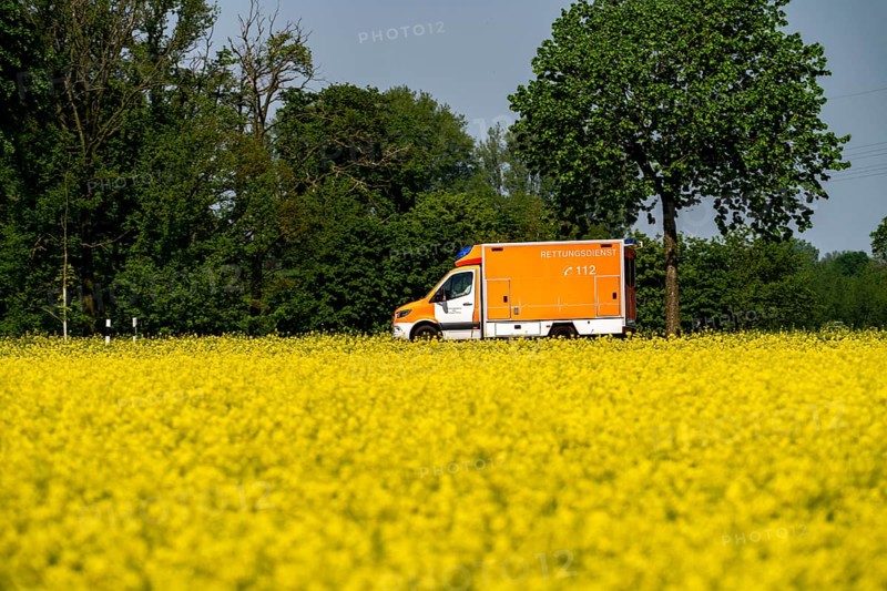 Landscape on the Lower Rhine, ambulance on the B57 federal road between Xanten and Kalkar, road traffic, North Rhine-Westphalia, Germany, Europe