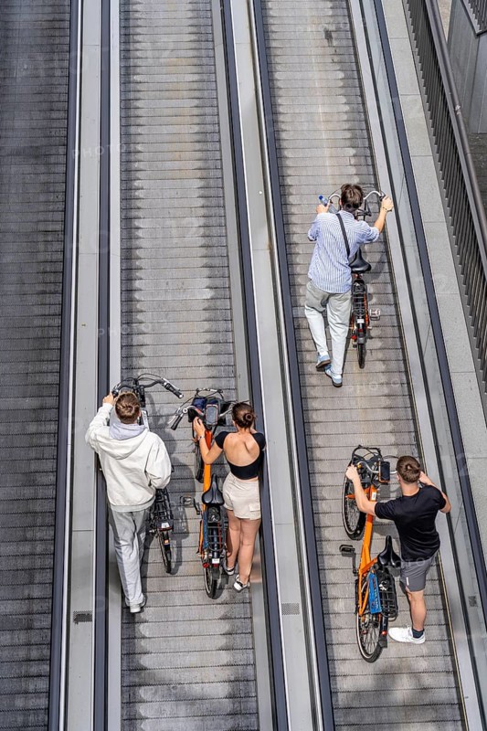 New bicycle car park at Amsterdam Central Station, Stationsplein, space for around 7000 bicycles, largest in Amsterdam, digitally monitored, underground, direct connection to the station and metro, Netherlands, escalators lead to the bicycle garage, Netherlands