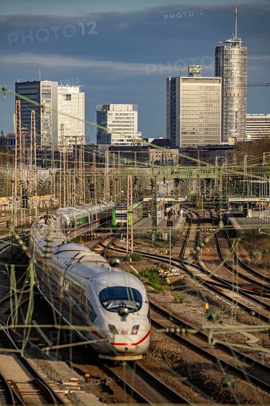 Train on the tracks west of Essen central station, skyline of the city centre, ICE train, North Rhine-Westphalia, Germany, Europe