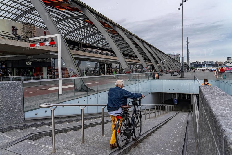 New bicycle car park at Amsterdam Central Station, IJboulevard, space for around 4000 bicycles, digitally monitored, single exit, underground, direct connection to the station, built into the water of the IJ, at the back of the station, Netherlands