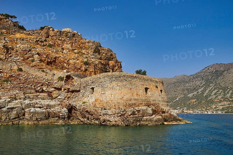 Round, stony old fortress on the seashore, embedded in a hilly landscape, Venetian sea fortress, Leper Island, Spinalonga, Elounda Bay, Mirabello Bay, East Crete, Crete, Greek Islands, Greece, Europe
