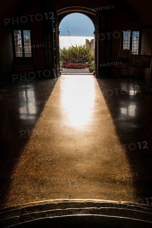 View from the inside of a city villa, light, sun, sunbeam, backlight, dramatic, architecture, villa, historical, Malcesine, Lake Garda, Italy, Europe