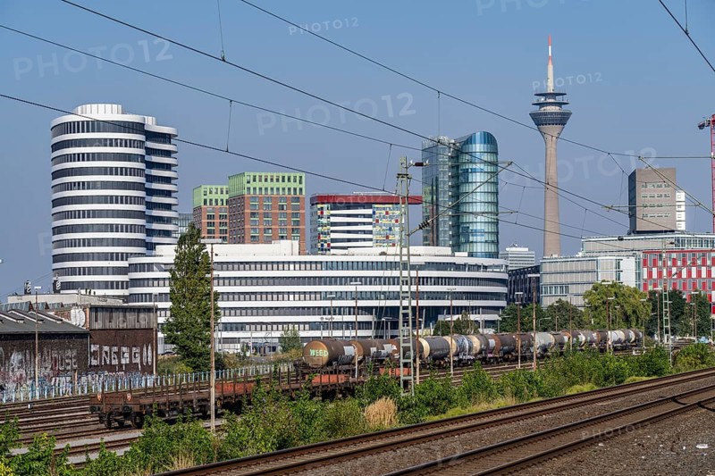 Düsseldorf city centre skyline, Medienhafen, railway tracks at Düsseldorf-Hamm stop, North Rhine-Westphalia, Germany, Europe