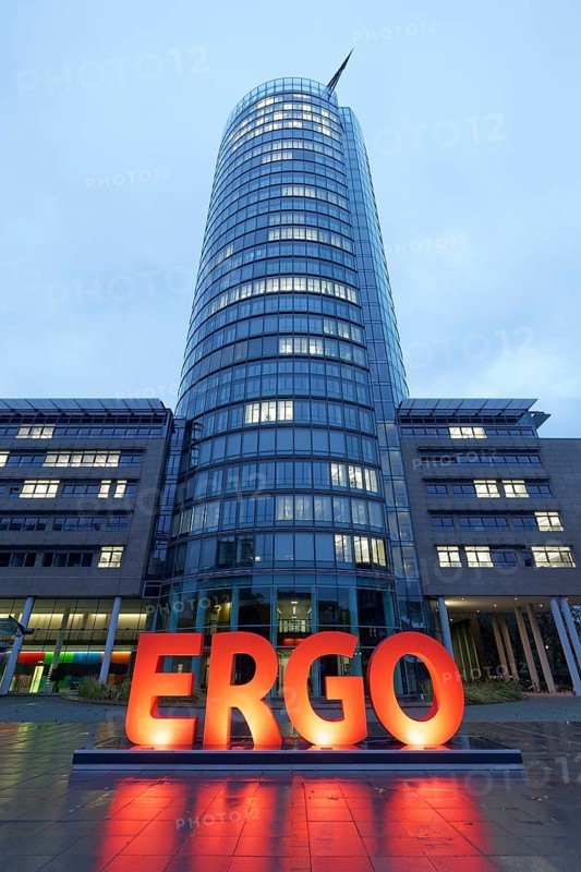 Illuminated logo in front of the headquarters of the ERGO Insurance Group, blue hour, Düsseldorf, North Rhine-Westphalia, Germany, Europe