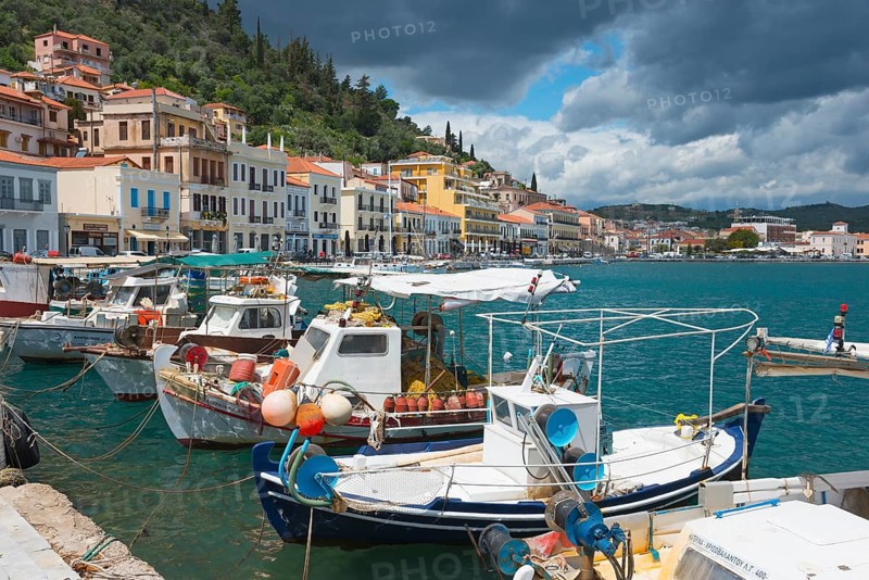 Historic coastal town with mooring boats on the water and colourful facades under a cloudy sky, harbour, Gythio, Mani, Laconia, Peloponnese, Greece, Githio, Gythion, Europe