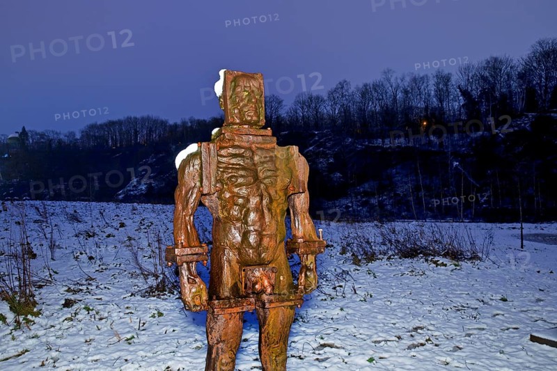 People made of iron, multi-part iron sculpture by Zbigniew Fraczkiewicz at the Henrichshütte in winter, Hattingen, Ruhr area, Germany, Europe