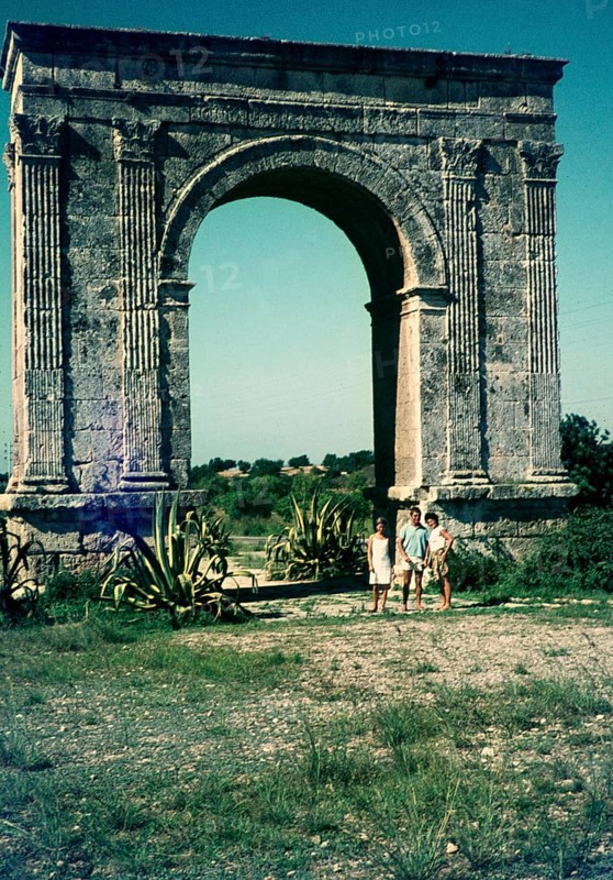 Arc de Bera, Roman Triumphal arch, Roda de Bera, Tarragona province, Catalonia, Spain 1966 three tourists standing