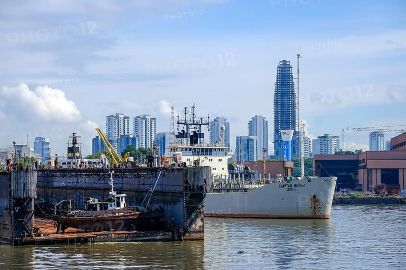 Buenos Aires, Argentina, Skyline of Buenos Aires on the Rio de la Plata. In front harbour with Tanador shipyard, South America
