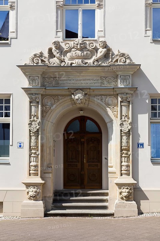 Richly decorated portal of the Seidemannhaus in the city centre of Taucha, Saxony, Germany, Europe