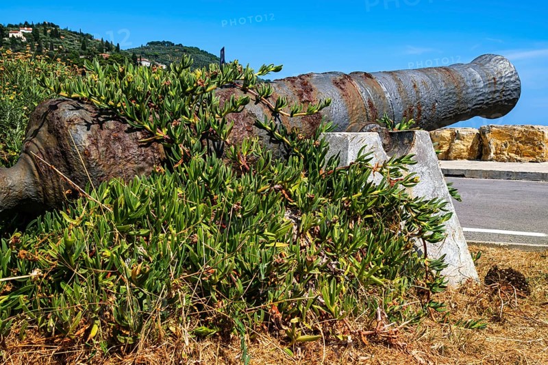 Old historic rusty cannons on the Long Pier in the Oneglia district of Imperia, Liguria, Italy, Europe