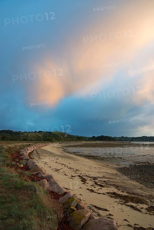 Coastal path along the beach at dusk with soft clouds in the sky, Plage de Raluzet, Plougrescant, Côtes-d'Armor, English Channel, Brittany, France, Europe