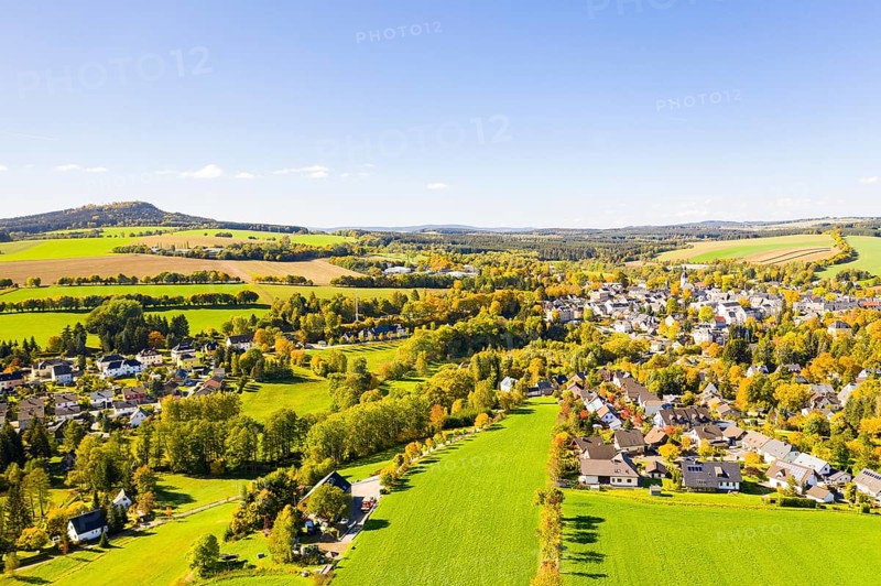 Town view of Schlettau from the air in autumn, Scheibenberg in the background, Erzgebirge, Saxony, Germany, Europe