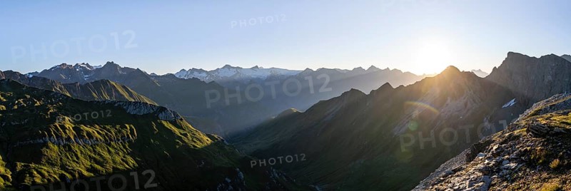 Panorama, mountain landscape at sunrise with sun star, view of mountain peaks of the Venediger group and into the Großbachtal valley from the summit of Bachlenkenkopf, Lasörling group, Hohe Tauern National Park, East Tyrol, Tyrol, Austria, Europe