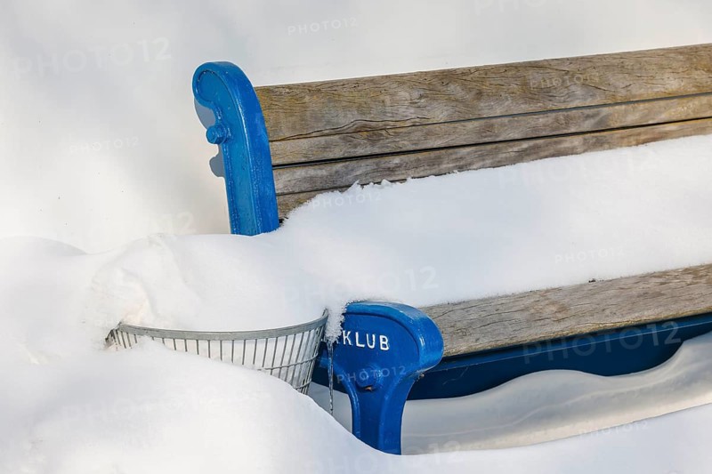 Hamm, North Rhine-Westphalia, Germany - Ice and snow on the river Lippe, bench with snow, rowing club Hamm