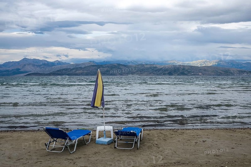 Kalamaki, Corfu, Greece, View from Kalamaki beach in the north-east of the Greek island of Corfu over the Ionian Sea towards mainland Albania, Europe