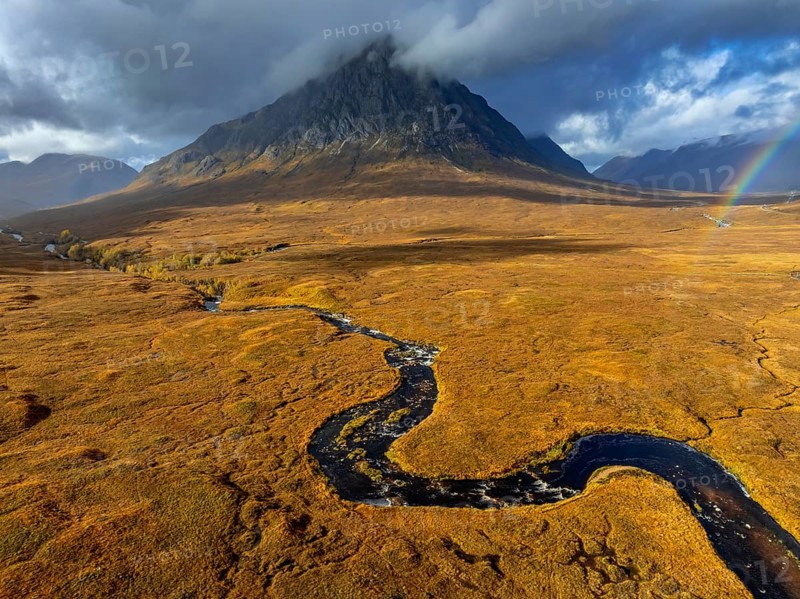Morning light, cloudy mood, river, moor, mountain landscape, aerial view, rainbow, autumn, view of Buachaille Etive Mòr, Glencoe, Scottish Highlands, Scotland, Great Britain