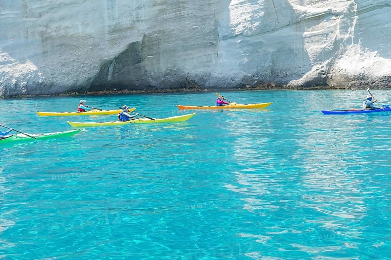 Group of people Kayaking, Kleftiko, Milos Island, Cyclades Islands, Greece, Europe