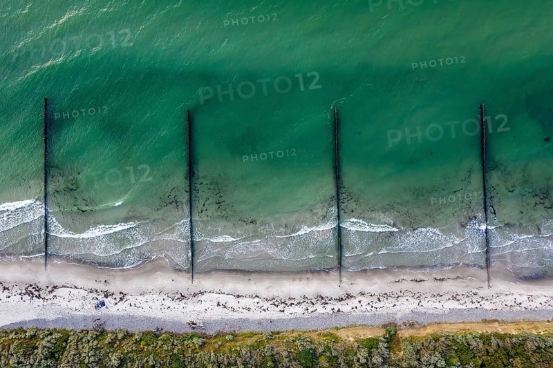 Aerial view over wooden groynes protection shoreline near Wustrow on the Fischland peninsula along the Baltic Sea, Mecklenburg-Vorpommern, Germany, Europe