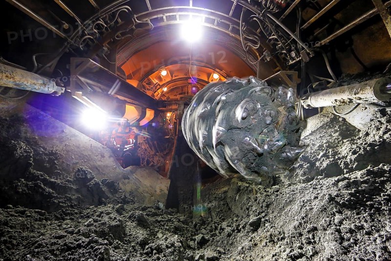 Theme photo Emscher conversion, the Emscher system will be wastewater-free in 2021 - new construction of a sewer on the Boye, the second largest tributary of the Emscher, a machine operator in the tunnelling machine digs the tunnel for the DN 3500 concrete wastewater pipes, the Boye is renaturalised and transformed into a near-natural body of water, was previously an open, above-ground wastewater sewer, mixed sewer with surface water and wastewater, the ecological conversion of the Emscher system consists of the construction of a central wastewater treatment system in the Ruhr area, the construction of sewers and the renaturalisation of the Emscher and its tributaries, archive photo from 13.11.2014, Bottrop, Ruhr area, North Rhine-Westphalia, Germany - -