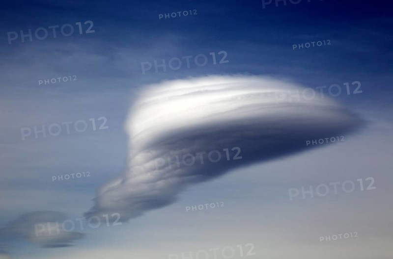 Lenticular cloud, altocumulus, lenticularis, formed over Alpujarras mountains, Almeria, Spain, Europe