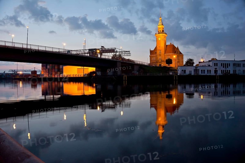 The old harbour office in the neo-renaissance style in the harbour in Dortmund at dusk, North Rhine-Westphalia, Germany, Europe